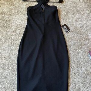 Black express dress size 2 , cross top